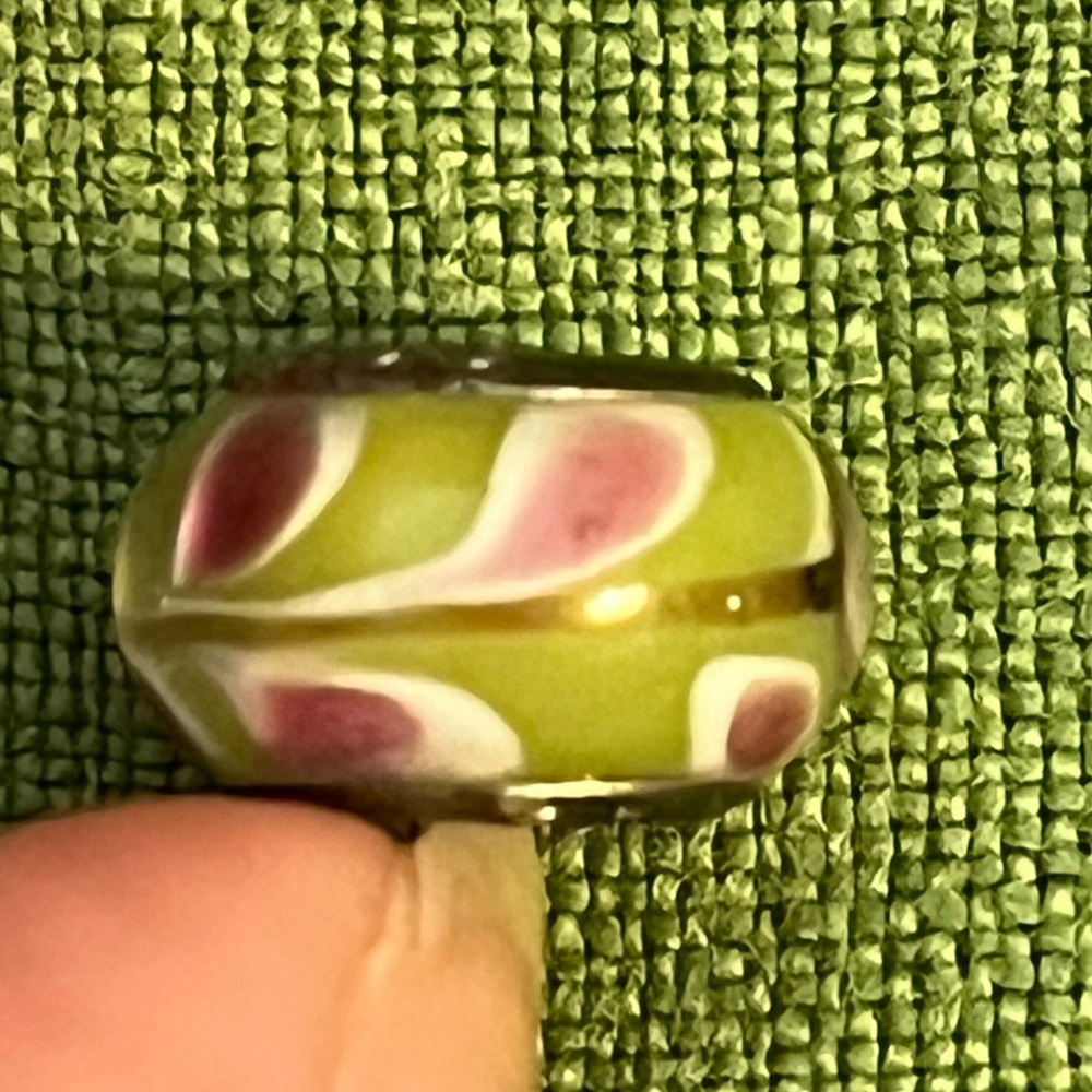 Pandora Murano glass charm, green background with pink and white swirl pattern